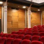 a red chairs in a theater